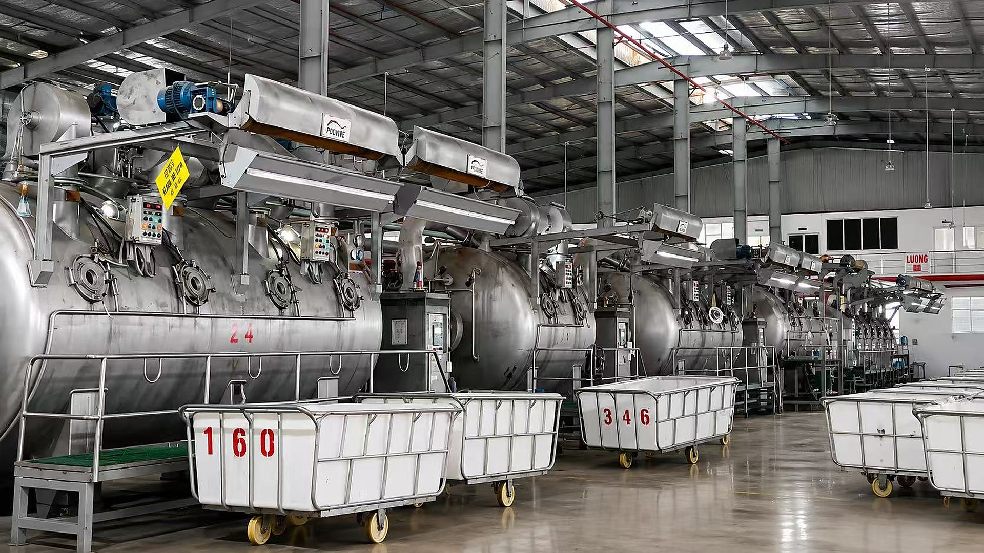 Industrial fabric dyeing machines in production facility